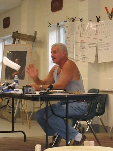 Tom Brown Jr. teaching a class indoors